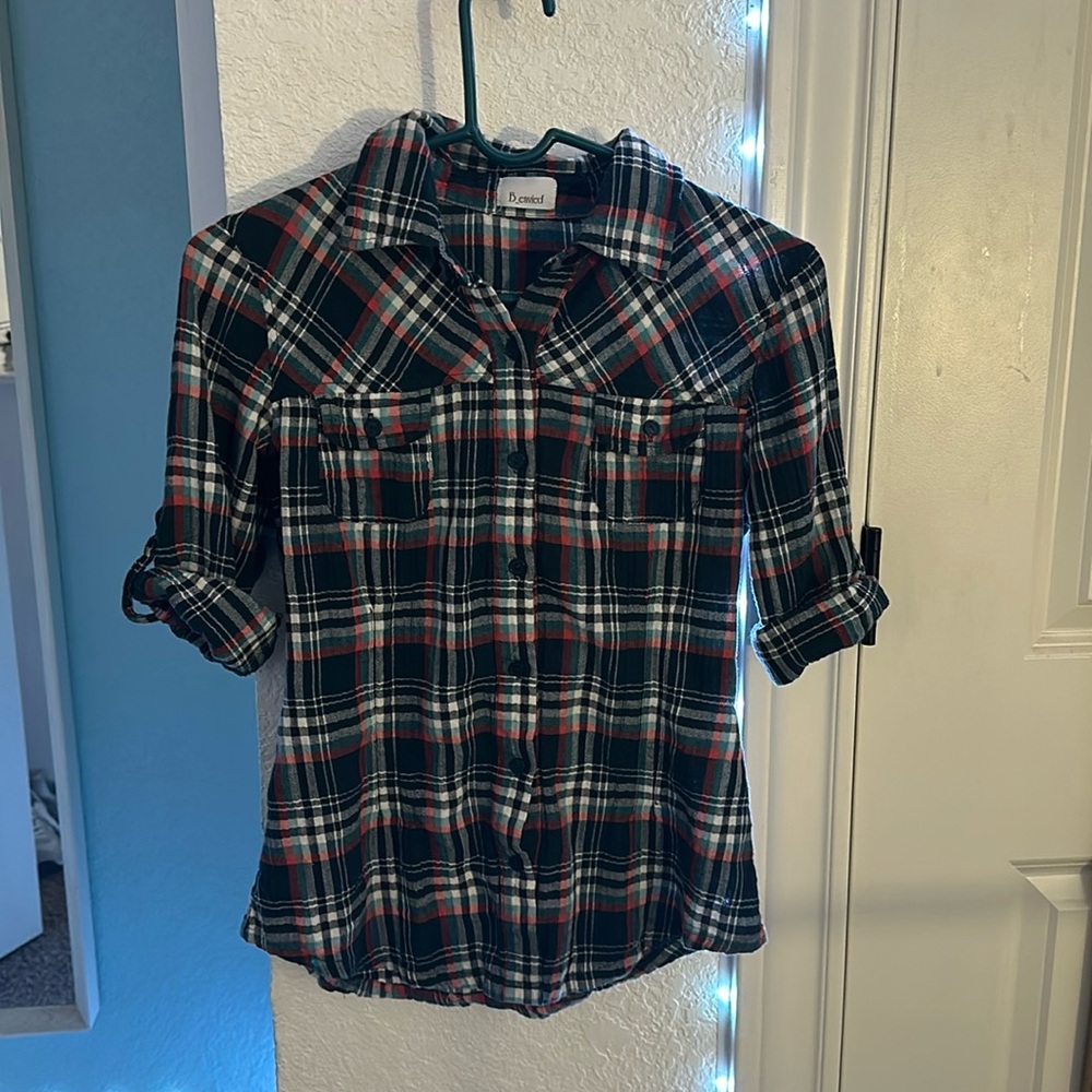 B_envied red, blue, and white plaid with tie in the back
Size medium